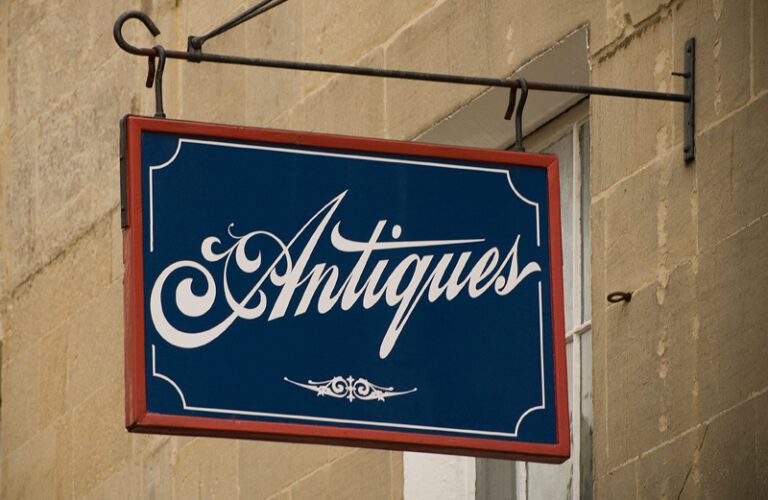 A hanging sign for an antiques store