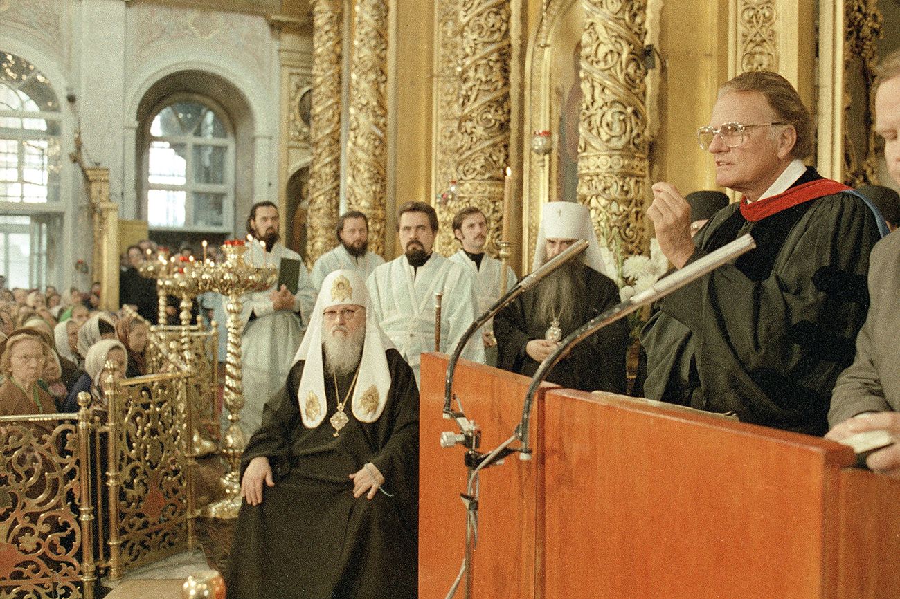 Patriarch Pimen, leader of the Russian Orthodox church, listens as Rev. Graham speaks in Moscow's main cathedral on Sept. 21, 1984.