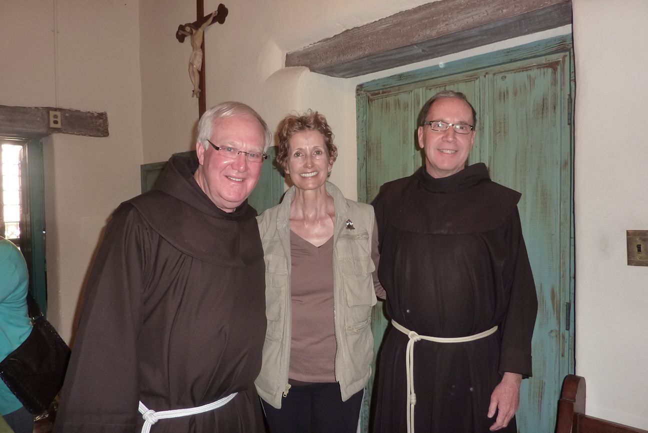 Day 18: Edie with Father Larry Gosselin, Associate Pastor, and Father Charles Talley, Pastor, at Mission Santa Barbara