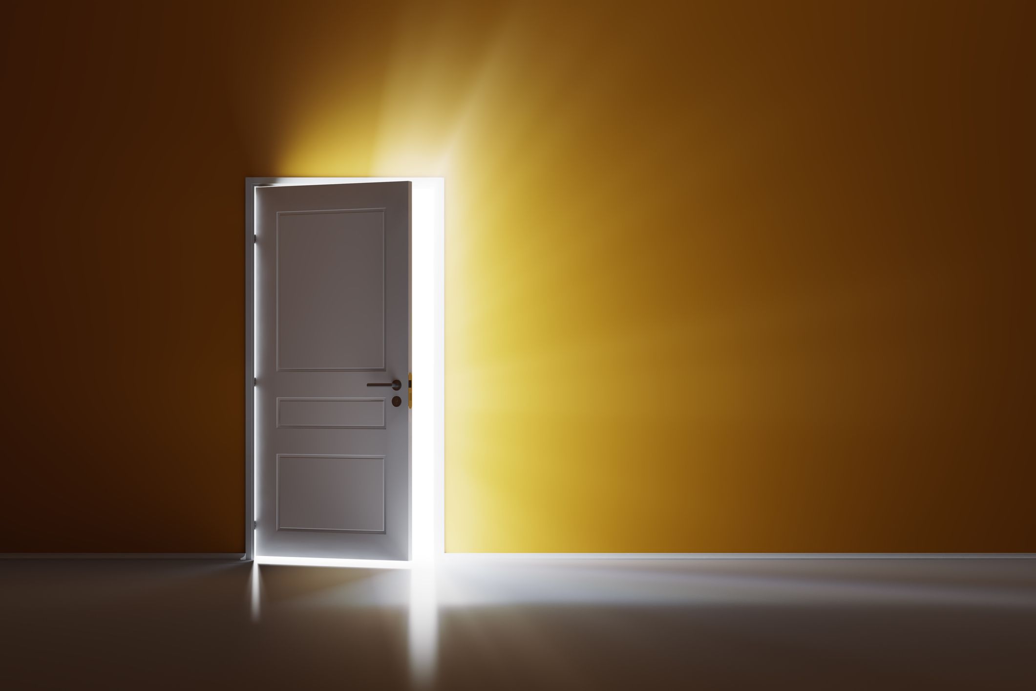 A door cracked open with light streaming through; Getty Images