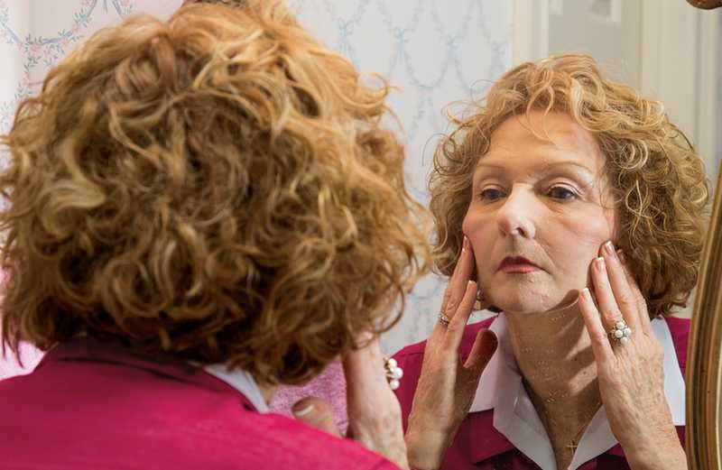 marion_bond_west_looks_at_herself_in_the_mirror_photo_by_brad_newton