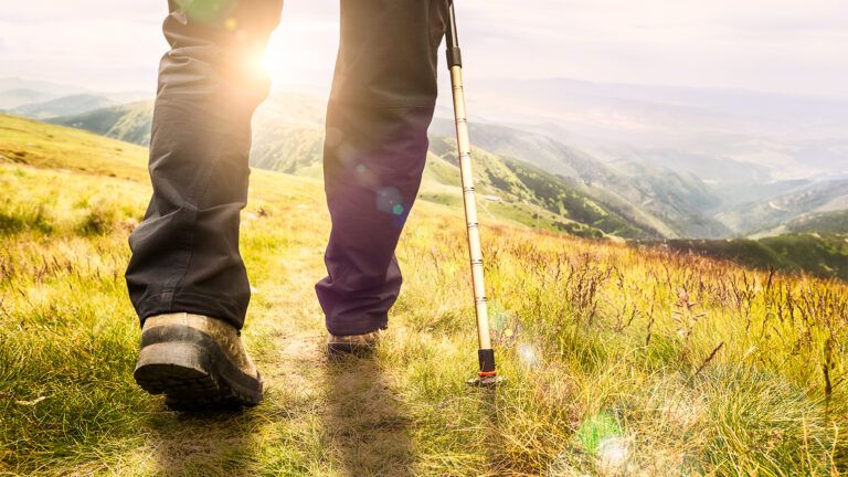 View of feet during a hike